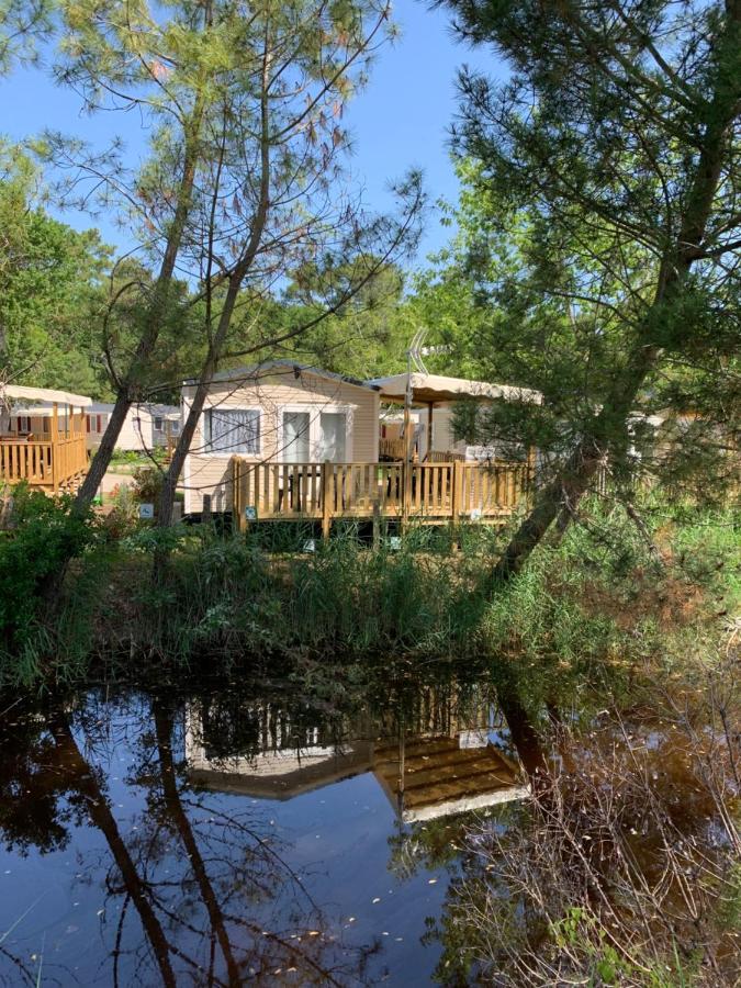 Envie D Un Break De Paysages Sauvages Et De Nature Ce Mobile Neuf Confort Climatise Idealement Situe Au Bord De L Eau Dans Un 4 Etoiles Vous Attend Pour Un Week End Quelques Jours Ou Des En Famille Camping Lège-Cap-Ferret